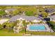 Aerial view of the community clubhouse and pool at 14205 Falls Church Dr # 2001, Orlando, FL 32837