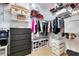 Organized walk-in closet with custom shelving and storage solutions at 150 Magnolia Park Trl, Sanford, FL 32773