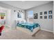 Playful bedroom features a themed decor, comfortable carpet, and a window providing natural light at 207 Polermo Ave, St Cloud, FL 34771