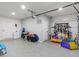 Spacious garage with storage and organization for Gathering fun and activities, plus an electric projector at 207 Polermo Ave, St Cloud, FL 34771