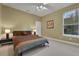 Tranquil bedroom with natural light, ceiling fan, and closet at 3334 Park Grove Ct, Longwood, FL 32779