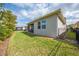 Fenced back yard with grass at 3415 Sagebrush St, Harmony, FL 34773