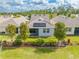 Birds eye view of the rear of the home showcasing a fenced yard and solar panels on the roof at 3415 Sagebrush St, Harmony, FL 34773