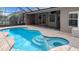 The screened-in patio features a sparkling pool with a spa, perfect for relaxation and entertainment at 3734 Safflower Terrace, Oviedo, FL 32766