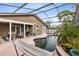 Relaxing screened-in pool area with adjacent patio, perfect for outdoor enjoyment at 409 Surrey Run, Casselberry, FL 32707