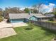 Aerial view shows the home's location on a large grassy lot at 418 Norwood Ct, Oviedo, FL 32765