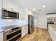 Kitchen featuring stainless steel appliances and bright white subway tile at 418 Norwood Ct, Oviedo, FL 32765