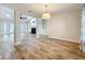 Spacious living room with light wood floors and ample natural light at 418 Norwood Ct, Oviedo, FL 32765