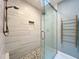 Updated shower with pebble floor and towel ladder at 418 Norwood Ct, Oviedo, FL 32765