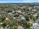 Extensive aerial view of the neighborhood, showcasing the beautiful landscaping and tree-lined streets at 421 Broadway Ave, Orlando, FL 32803