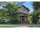 Charming two-story home with inviting front porch and manicured landscaping at 421 Broadway Ave, Orlando, FL 32803