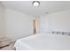 Large bedroom with an ensuite bathroom; the bedroom has a neutral color palette at 5025 Walker St, St Cloud, FL 34771