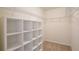 Walk-in closet with custom shelving to maximize storage space at 5025 Walker St, St Cloud, FL 34771