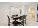 Dining room features a modern chandelier and dark wood table at 5025 Walker St, St Cloud, FL 34771