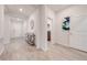 Hallway featuring recessed lighting, tile flooring, and a view of the front door at 5301 Amersham Ln, St Cloud, FL 34771