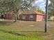 Exterior view of a well-kept single Gathering home in a residential neighborhood at 721 Waxwing Ct, Kissimmee, FL 34759