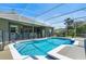 Inviting screened-in pool area with a secure safety fence, providing peace of mind and poolside enjoyment at 806 Roswell Cv, Lake Mary, FL 32746