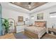 Inviting bedroom featuring tray ceiling, neutral colors, and natural lighting at 936 Allendale Ln, Winter Garden, FL 34787