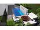 A modern pool design with patio furniture and a decorative water feature at 936 Allendale Ln, Winter Garden, FL 34787