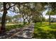 Scenic street view with tree-lined sidewalks and charming homes, creating a welcoming atmosphere at 936 Allendale Ln, Winter Garden, FL 34787