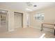 Bedroom featuring closet, open walk-in closet, window, and doorway at 1109 Denton Rd, Winter Park, FL 32792