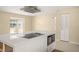 Bright kitchen with stainless steel appliances and a large center island at 1109 Denton Rd, Winter Park, FL 32792