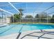 Large screened in pool with ladder for easy access at 1109 Denton Rd, Winter Park, FL 32792