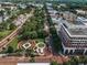 Breathtaking aerial view of the city showcasing a park, train tracks, and beautiful architecture at 1213 Richmond Rd, Winter Park, FL 32789