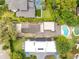 Overhead aerial view of two homes, showing the pools, driveways, and lush landscaping at 1213 Richmond Rd, Winter Park, FL 32789
