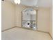 Bright hallway with a decorative wrought iron railing feature at 1213 Richmond Rd, Winter Park, FL 32789