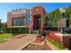 Beautiful exterior shot of the Winter Park Historical Museum and grounds with brick facade and manicured landscape at 1213 Richmond Rd, Winter Park, FL 32789