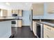 Bright kitchen with stainless steel appliances, granite countertops and plenty of cabinet space at 1213 Richmond Rd, Winter Park, FL 32789