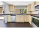 Kitchen with stainless steel appliances, granite countertops and plenty of cabinet space at 1213 Richmond Rd, Winter Park, FL 32789