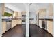 Open kitchen featuring stainless steel appliances, bar area and granite countertops at 1213 Richmond Rd, Winter Park, FL 32789