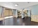 This house features wood floors, an open archway to the kitchen and a sliding glass door at 1213 Richmond Rd, Winter Park, FL 32789