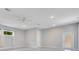 Spacious living room with neutral walls, recessed lighting, ceiling fan and lots of natural light at 1213 Richmond Rd, Winter Park, FL 32789