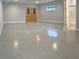 Spacious room with concrete flooring, neutral walls, and natural light at 1213 Richmond Rd, Winter Park, FL 32789