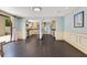 This house features wood floors, an open archway to the kitchen and a sliding glass door at 1213 Richmond Rd, Winter Park, FL 32789