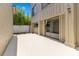 Private outdoor patio featuring a sliding glass door to the home, perfect for relaxing or entertaining guests at 1213 Richmond Rd, Winter Park, FL 32789