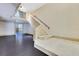 Elegant staircase with decorative railing and tile landing leading to the upper level at 1213 Richmond Rd, Winter Park, FL 32789