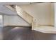 Elegant staircase with decorative railing and tile landing leading to the upper level at 1213 Richmond Rd, Winter Park, FL 32789