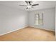 Bright bedroom with carpet, ceiling fan, and natural light from the window at 1317 S Pine Ridge Cir # 1317, Sanford, FL 32773