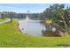 Pond with fountain and lush landscaping at 1317 S Pine Ridge Cir # 1317, Sanford, FL 32773