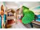 Bedroom featuring custom-themed bunkbeds, playful decor, and imaginative design at 1412 Moon Valley Dr, Davenport, FL 33896