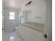 Bright, renovated bathroom featuring a granite vanity and tiled shower at 1442 S Hawthorne Ave, Apopka, FL 32703