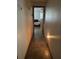 Hallway with tile floors that leads into the bedroom at 15683 Sw 46Th Cir, Ocala, FL 34473