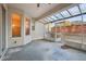 Enclosed patio featuring a translucent roof and view of the backyard at 1601 Stoneywood Way, Apopka, FL 32712