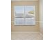 Sunlit room with large windows and white blinds at 1601 Stoneywood Way, Apopka, FL 32712