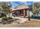 Charming market storefront featuring large windows, outdoor seating, and a welcoming entrance in a walkable neighborhood at 1676 Blue Lagoon Cir, Mascotte, FL 34753