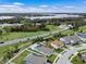 An aerial view of the home, community, and nearby lake at 1740 Standing Rock Cir, Oakland, FL 34787